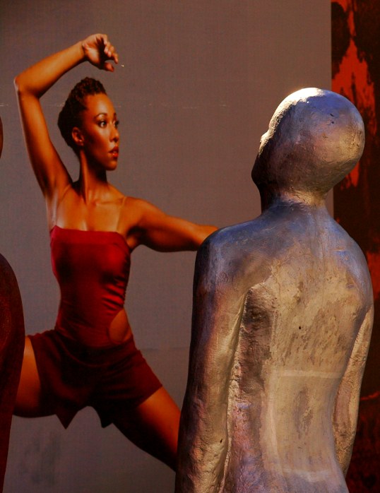 Some of the sculptures were looking at old posters advertising the arts stuck to the walls of the construction site.