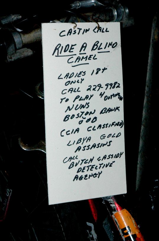 Sign attached to bicycle, French Quarter, New Orleans, Louisiana
