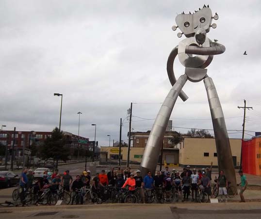 Bike Riders under the Travelling Man
