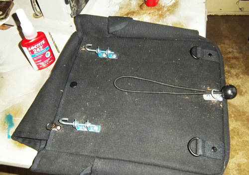 The two hooks, the ring at the bottom, and the bungee cord. Ready to go.