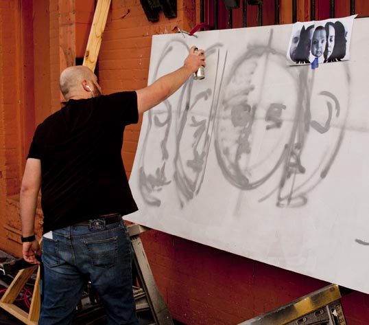 Justin Clumpner starting on his mural