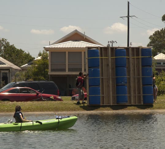 The barge arrives and is flipped