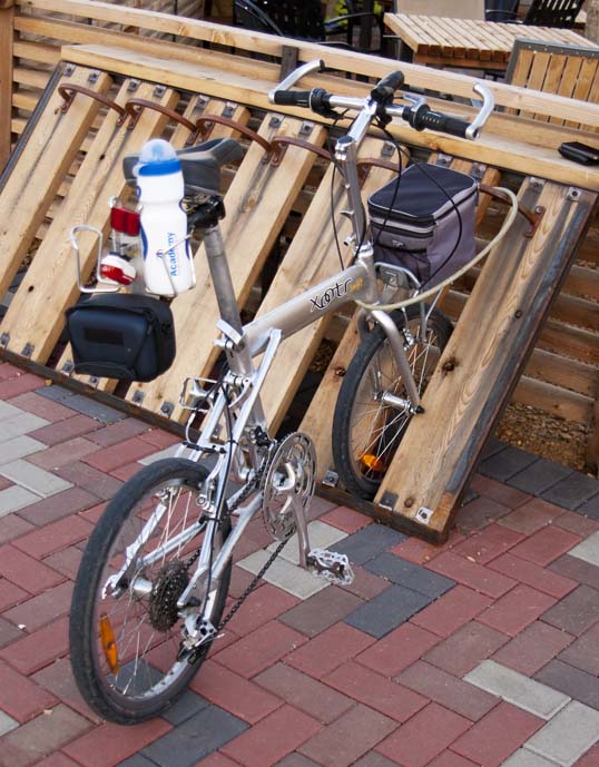 My Xootr Swift folding bike in the cool bike rack in front of the Cold Beer Company Deep Ellum, Dallas, Texas
